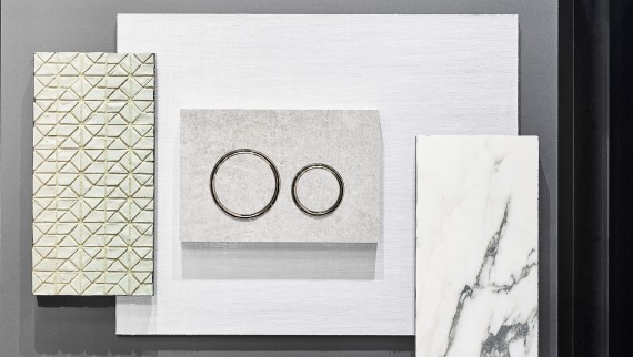 De Sigma 21 bedieningsplaat in betonlook en met verchroomde designringen De Sigma 21 bedieningsplaat in betonlook en met verchroomde designringen