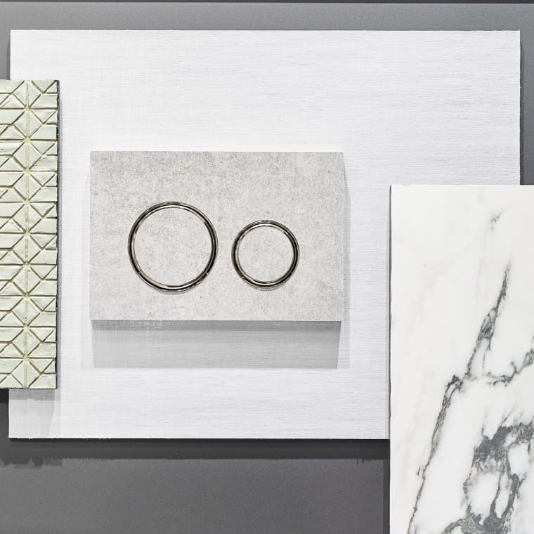 De Sigma 21 bedieningsplaat in betonlook en met verchroomde designringen De Sigma 21 bedieningsplaat in betonlook en met verchroomde designringen